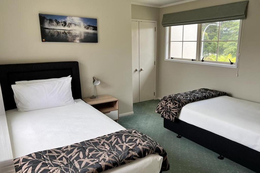 Silver Fern Rotorua Suites & Spa Экстерьер фото A bedroom at the hotel