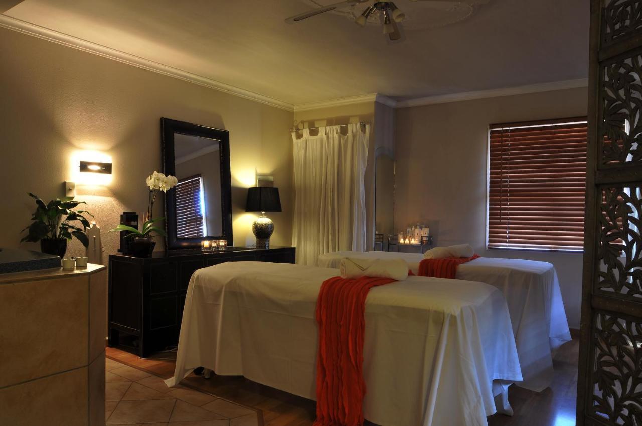 Silver Fern Rotorua Suites & Spa Экстерьер фото A massage room at a spa
